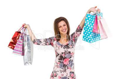 Woman standing with shopping bag