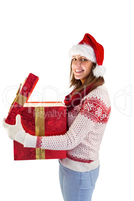 Girl opening a magical christmas gift