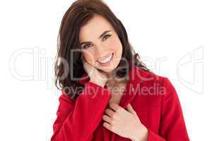 Portrait of a smiling brunette in red coat