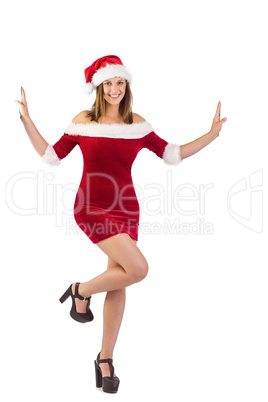 Festive girl posing with hands