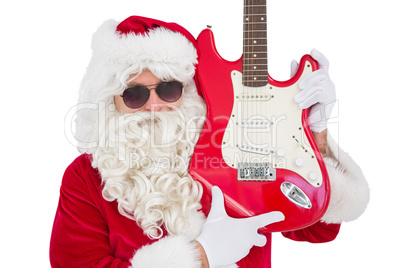 Cool santa showing electric guitar