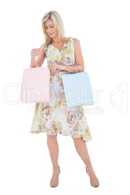 Elegant blonde with shopping bags