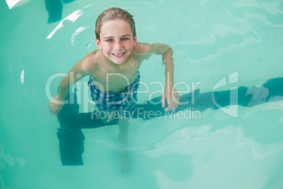 Little boy swimming in the pool