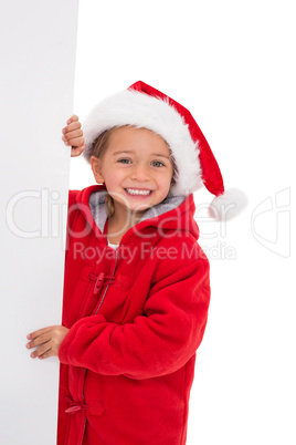 Festive little girl holding poster