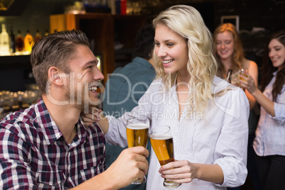 Young couple having a drink together