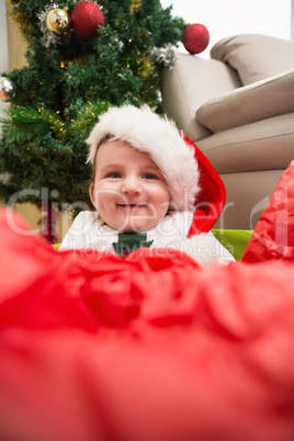 Cute baby boy in large christmas present