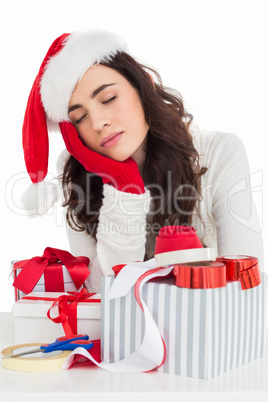 Brown hair in santa hat napping