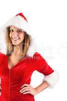 Pretty girl in santa costume looking at camera
