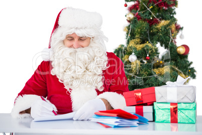 Happy santa writing letter for gifts