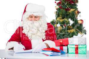 Happy santa writing letter for gifts