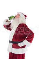 Father Christmas drinks beer with closed eyes