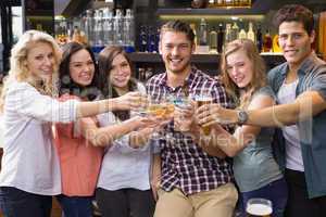 Young friends having a drink together