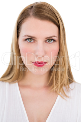 Portrait of a serious blonde woman looking at camera Portrait of a serious blonde woman looking at camera