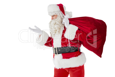 Santa with hand out and holding sack