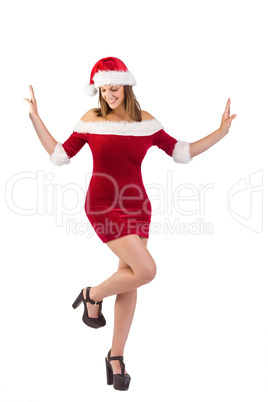 Smiling santa girl posing with hands