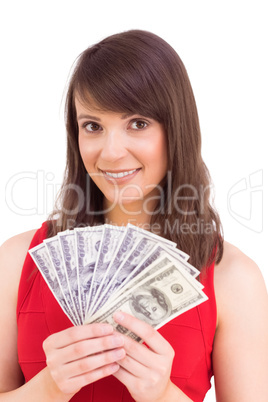 Brunette showing fan of dollars