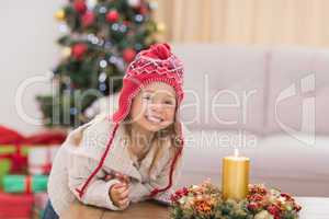 Cute little girl smiling at christmas