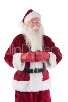 Santa Claus wears boxing gloves