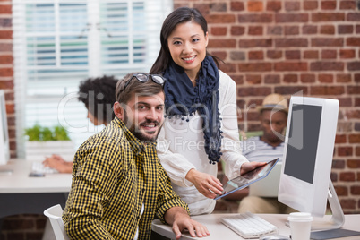 Creative business people with digital tablet Creative business people with digital tablet