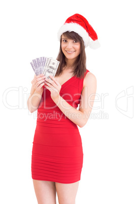 Festive brunette in red dress showing her cash