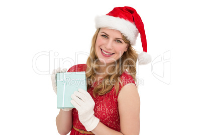 Smiling blonde in red dress wearing gloves and santa hat