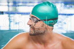 Close up of a fit swimmer in the pool