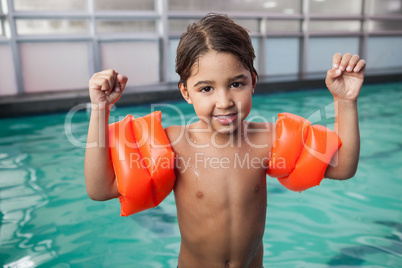 Little boy smiling at the pool