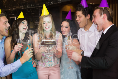 Attractive friends celebrating a birthday Attractive friends celebrating a birthday