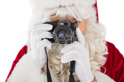Portrait of santa taking a photo