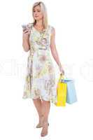Elegant blonde with shopping bags