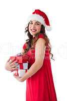 Festive brunette holding pile of presents