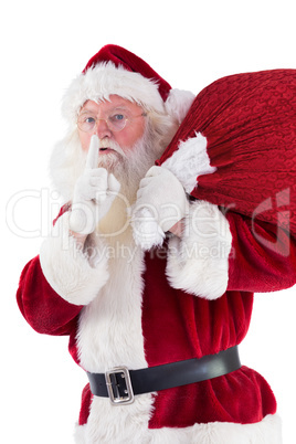 Santa asking for quiet with bag