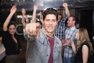 Stylish man smiling and dancing