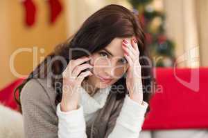 Brunette on the phone on christmas day