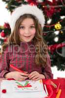 Festive little girl drawing pictures