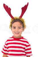 Cute little boy wearing antlers