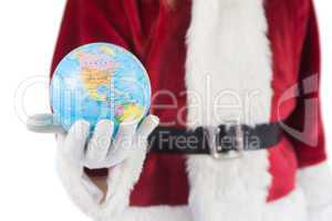 Santa has a globe in his hand