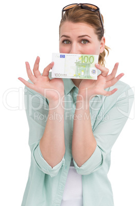 Pretty woman showing an one hundred euro note