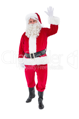 Cheerful santa claus waving