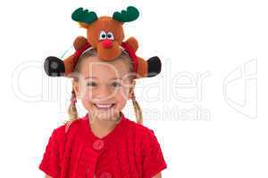 Cute little girl wearing rudolph headband