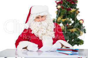 Portrait of father christmas writing list