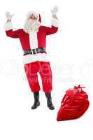 Happy santa claus with sack full of gifts