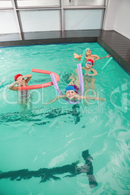 Cute little kids in the swimming pool