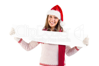 Festive blonde showing a blank banner