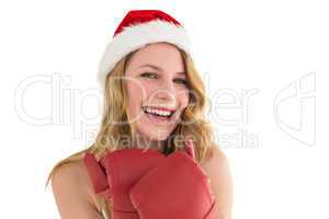 Smiling blonde wearing red boxing gloves