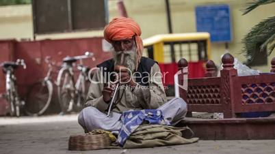 Street snake charmer. India.