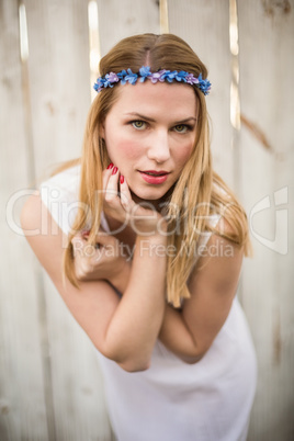 Pretty blonde woman posing while wearing headband