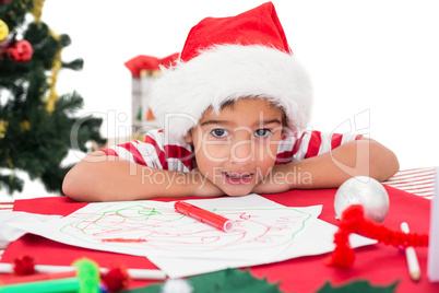 Festive little boy drawing pictures