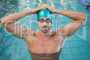 Portrait of a fit swimmer in the pool