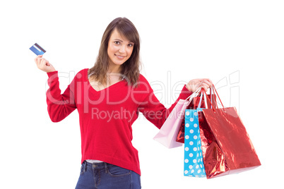 Brunette holding gift and credit card